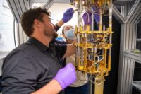 PNNL quantum researchers adjust dilution refrigerator